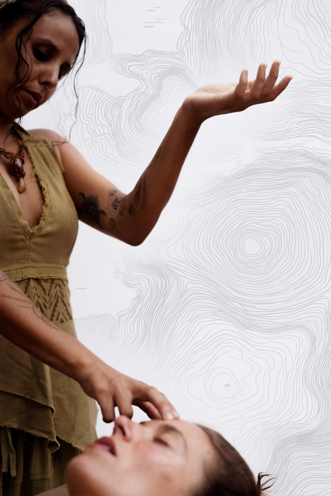 Hands-on somatic session: practitioner listening to the body